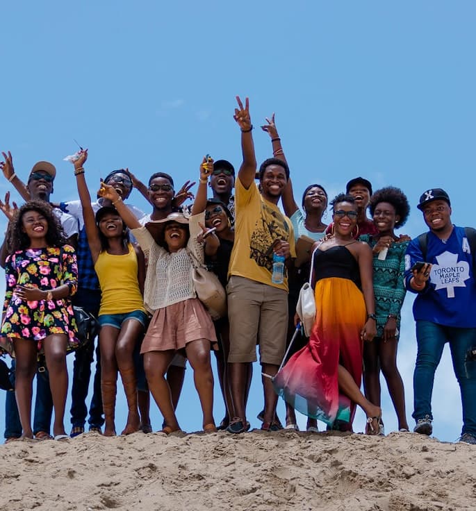 Friends celebrating on a beach